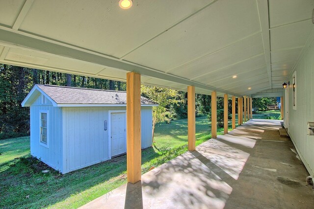 view of patio with an outdoor structure