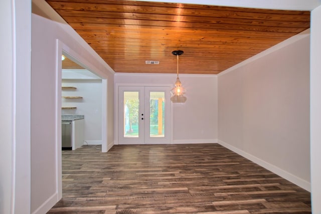 empty room with ornamental molding, wood ceiling, and french doors
