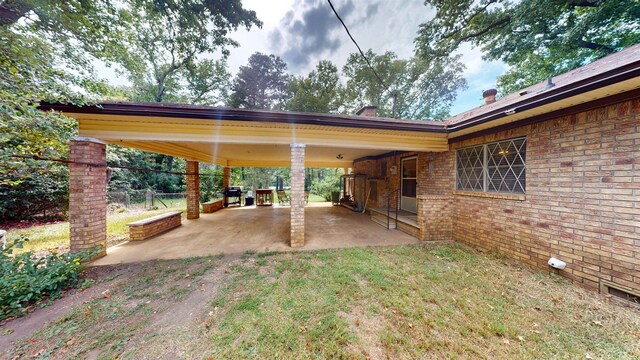 exterior space featuring a carport