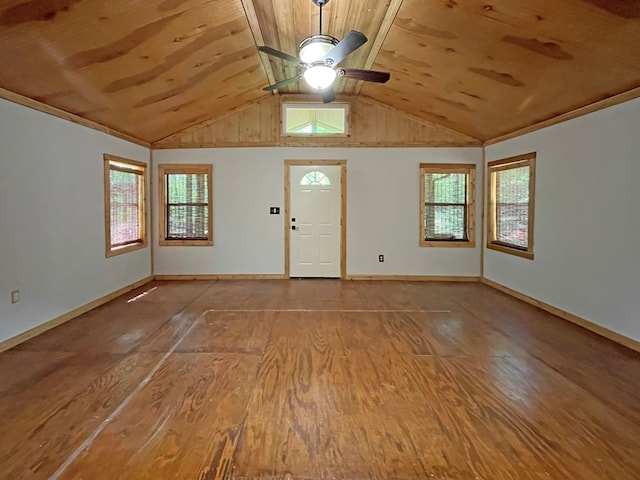 foyer entrance with wood finished floors, plenty of natural light, a ceiling fan, and wooden ceiling