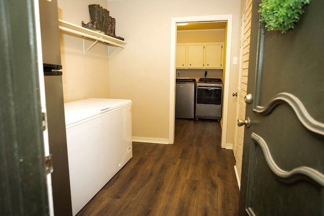 157 Craig St, Jasper, TX 75951 - washroom with independent washer and dryer, cabinet space, and dark wood-style floors