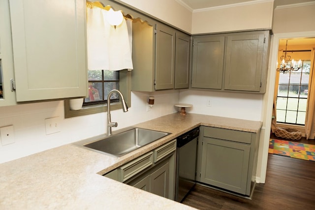 157 Craig St, Jasper, TX 75951 - kitchen with dishwasher, crown molding, a chandelier, decorative backsplash, and light countertops