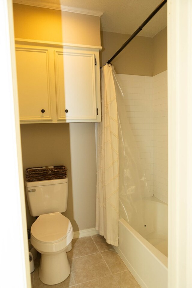 157 Craig St, Jasper, TX 75951 - full bath featuring shower / bath combination with curtain and tile patterned flooring
