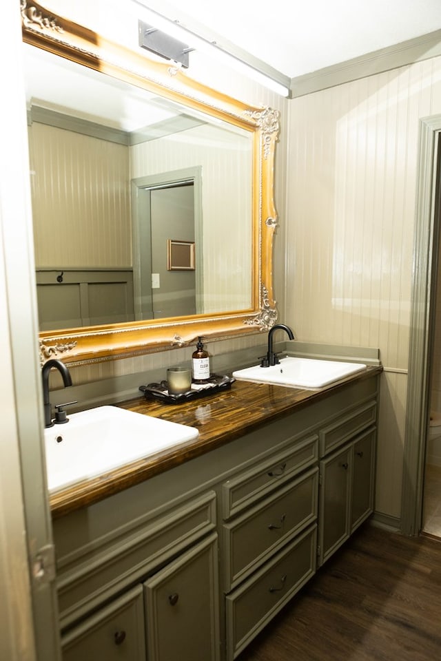 157 Craig St, Jasper, TX 75951 - bathroom featuring double vanity and wood finished floors