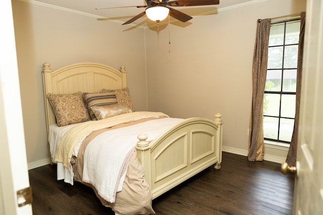 157 Craig St, Jasper, TX 75951 - bedroom featuring ornamental molding, dark wood-type flooring, and a ceiling fan