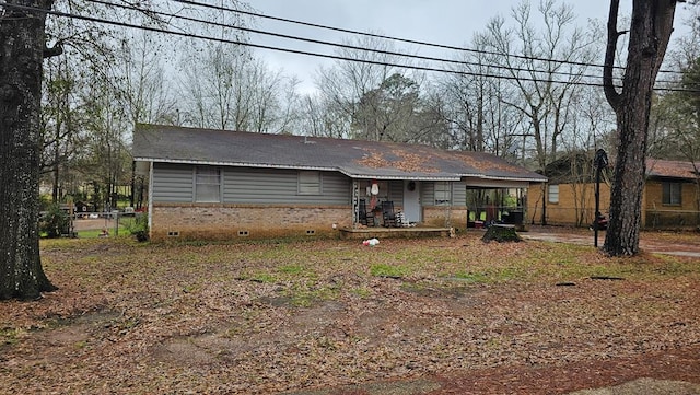 view of front facade featuring a carport