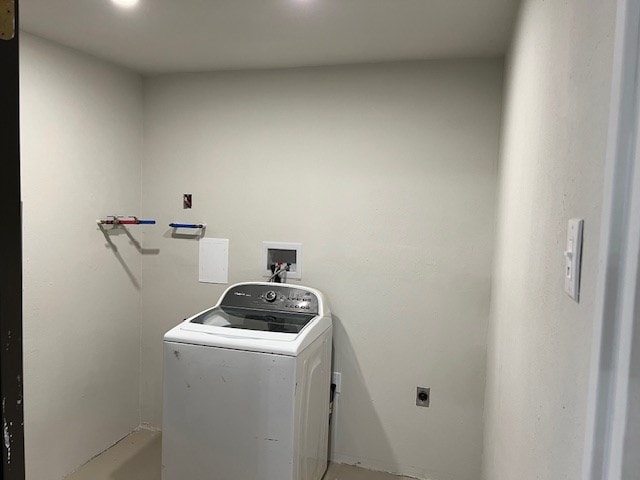 clothes washing area featuring washer / clothes dryer