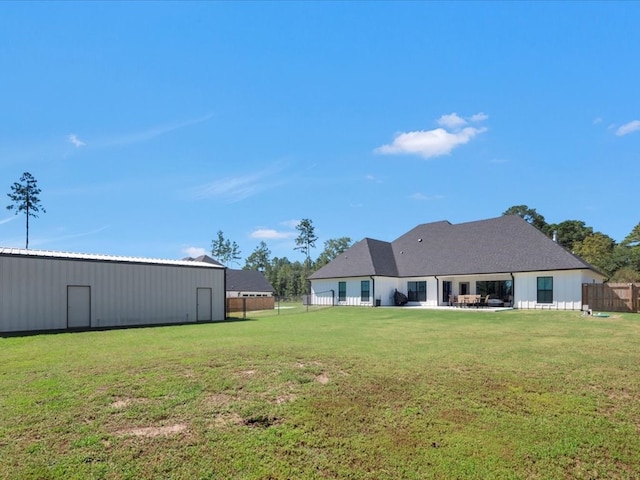 387 Cc Rd, Diboll, TX 75941 - view of yard with an outbuilding and a patio area