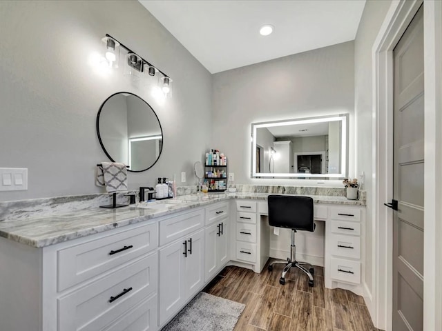 387 Cc Rd, Diboll, TX 75941 - bathroom featuring wood finished floors, vanity, and recessed lighting