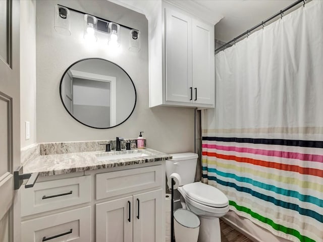 387 Cc Rd, Diboll, TX 75941 - bathroom with vanity, toilet, curtained shower, and wood finished floors