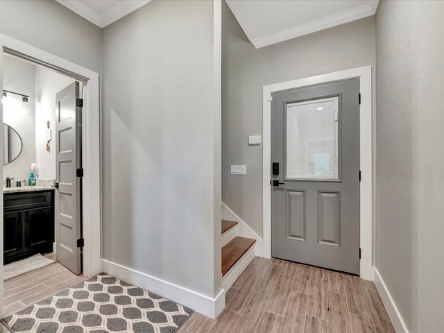 387 Cc Rd, Diboll, TX 75941 - foyer entrance with wood finish floors, crown molding, baseboards, and stairs