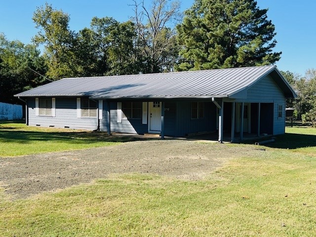 ranch-style home with a front yard