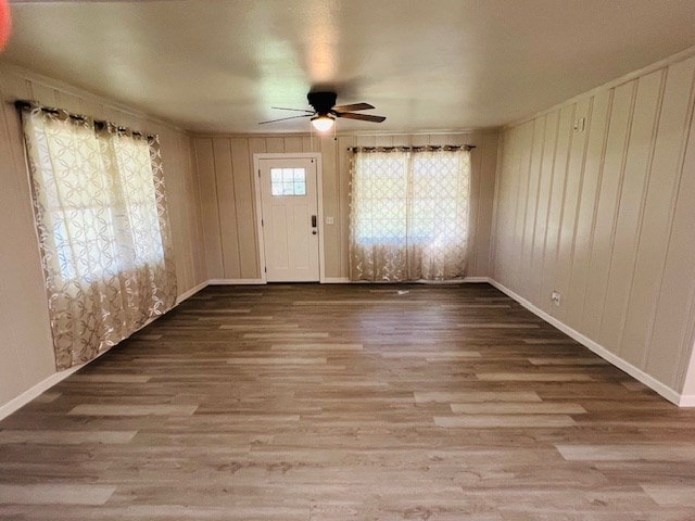 entrance foyer with wood-type flooring and ceiling fan