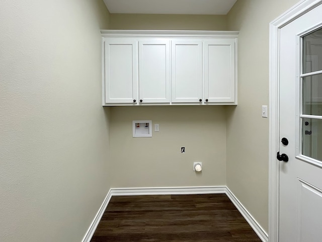 laundry room featuring baseboards, cabinet space, dark wood finished floors, and hookup for a washing machine