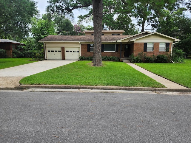 911 Allendale, Lufkin, TX 75904 - view of front of house with an attached garage, concrete driveway, a front lawn, and brick siding