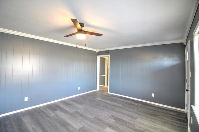 811 Overstreet Cir, Crockett, TX 75835 - empty room with ceiling fan, wood finished floors, ornamental molding, and baseboards