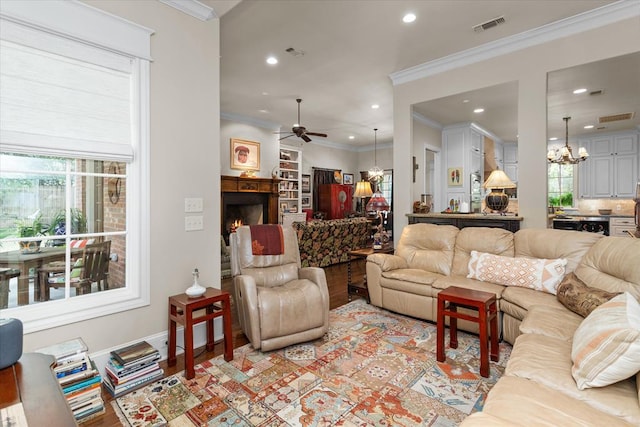102 Harmony Hill Ct, Lufkin, TX 75901 - living room featuring a chandelier, plenty of natural light, a ceiling fan, recessed lighting, and light wood-type flooring