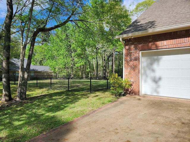 102 Harmony Hill Ct, Lufkin, TX 75901 - view of yard with driveway and a garage