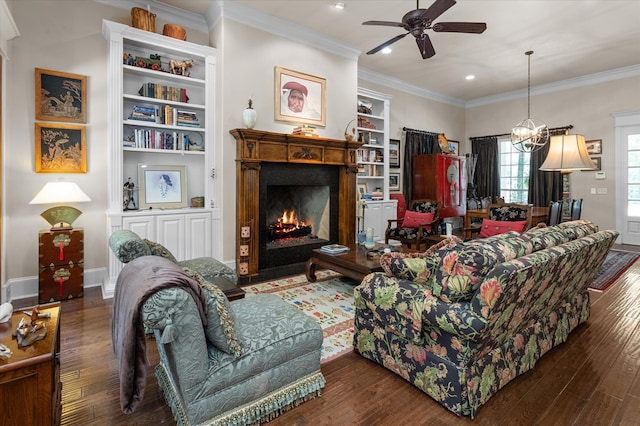 102 Harmony Hill Ct, Lufkin, TX 75901 - living area featuring wood-type flooring, recessed lighting, ceiling fan, built in shelves, and a warm lit fireplace