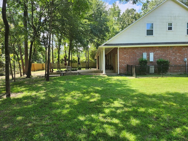 102 Harmony Hill Ct, Lufkin, TX 75901 - view of yard featuring a patio area