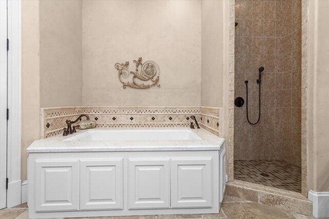 102 Harmony Hill Ct, Lufkin, TX 75901 - bathroom featuring a tile shower and a garden tub