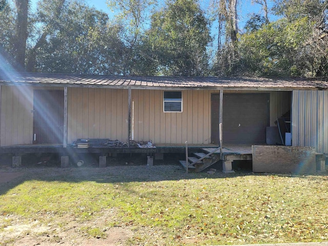 view of home's exterior featuring a lawn