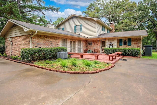 view of front of property with cooling unit and a deck