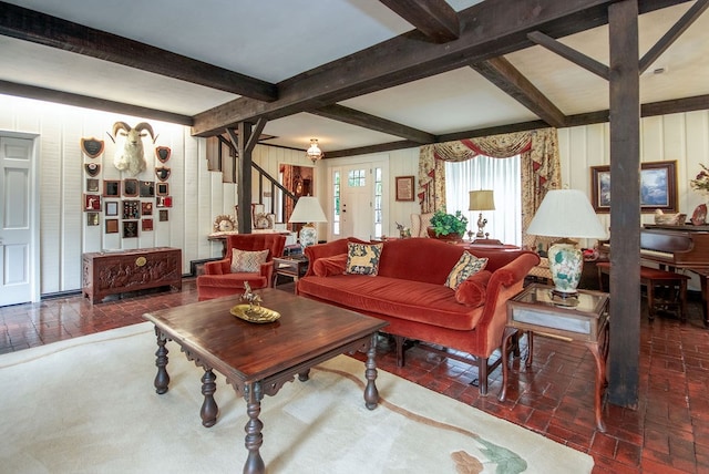 living room with beamed ceiling