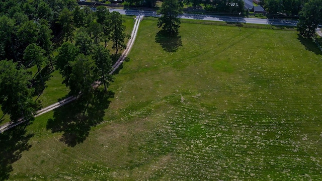 birds eye view of property featuring a rural view