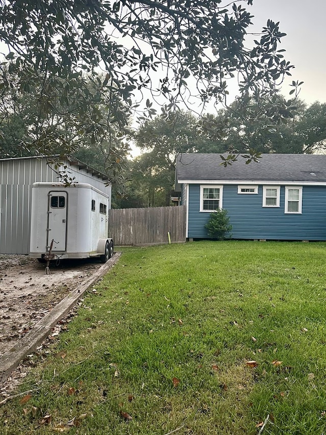 view of yard with a storage shed