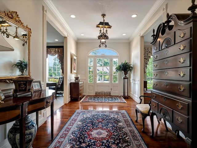 interior space featuring dark wood-type flooring and crown molding