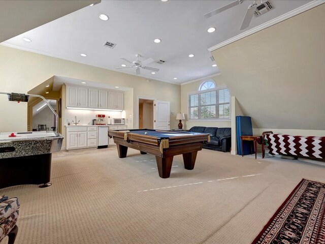 game room featuring light colored carpet, ceiling fan, crown molding, and pool table