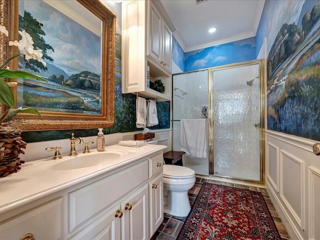 bathroom featuring toilet, vanity, an enclosed shower, and ornamental molding