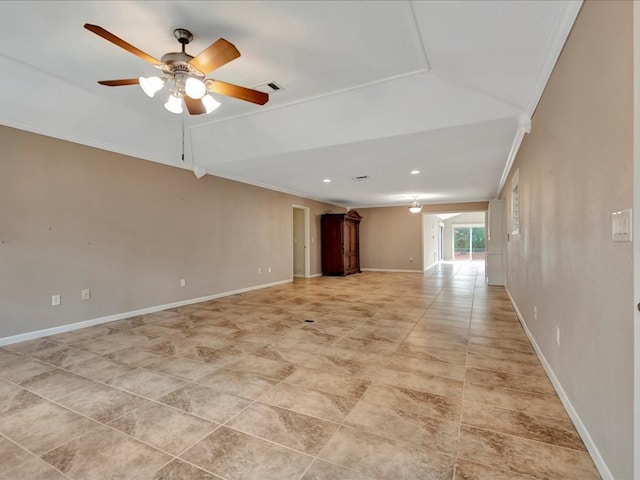 tiled empty room featuring crown molding, lofted ceiling, and ceiling fan