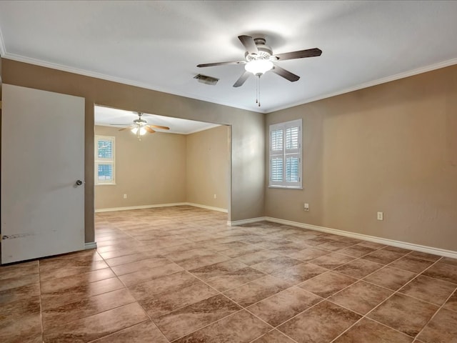 tiled empty room with crown molding and ceiling fan