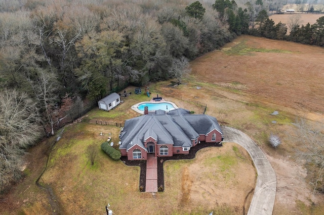 birds eye view of property featuring a rural view