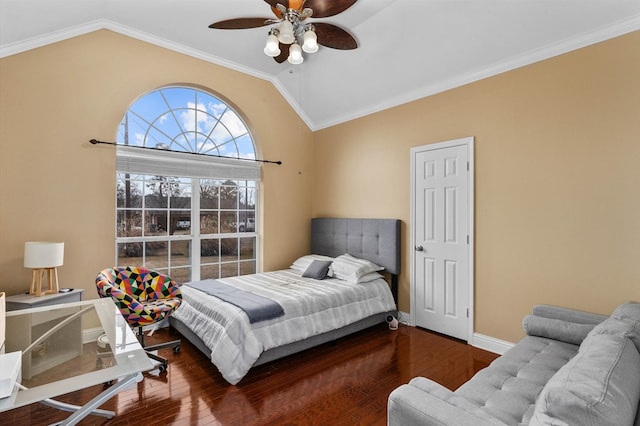 bedroom featuring ceiling fan, lofted ceiling, dark hardwood / wood-style flooring, and ornamental molding