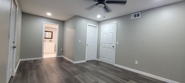 110 Hines St, Diboll, TX 75941 - unfurnished bedroom with dark wood finished floors, ensuite bathroom, recessed lighting, and ceiling fan