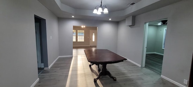 110 Hines St, Diboll, TX 75941 - hall featuring wood finished floors, a chandelier, recessed lighting, and a raised ceiling