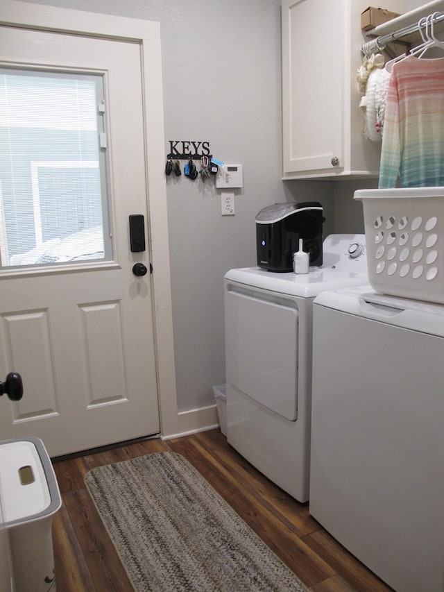 1208 Leslie Ln, Lufkin, TX 75901 - washroom featuring cabinet space, washer and dryer, and dark wood-style floors