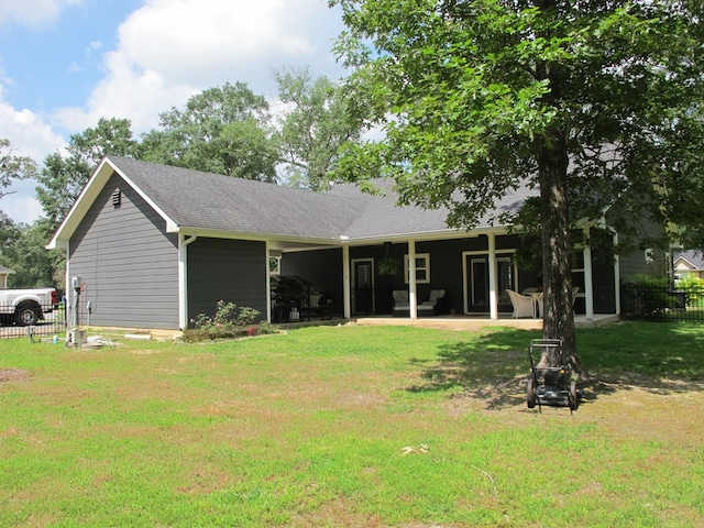 1208 Leslie Ln, Lufkin, TX 75901 - rear view of house featuring roof with shingles