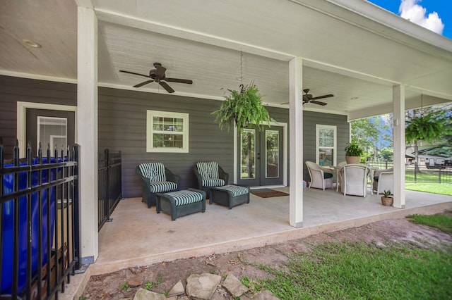 1208 Leslie Ln, Lufkin, TX 75901 - view of patio / terrace with ceiling fan, french doors, and outdoor lounge area