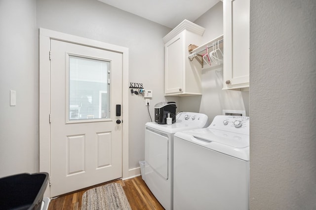 1208 Leslie Ln, Lufkin, TX 75901 - washroom with cabinet space, washing machine and dryer, and wood finished floors
