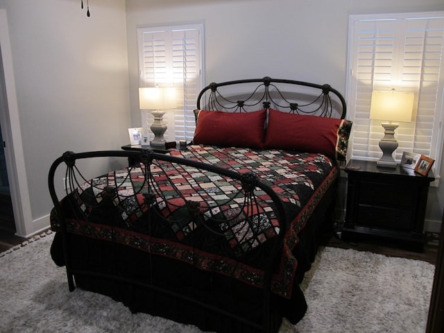 1208 Leslie Ln, Lufkin, TX 75901 - bedroom with baseboards and wood finished floors
