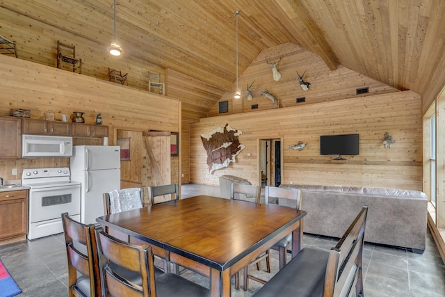 dining room with beam ceiling, wooden ceiling, tile patterned flooring, high vaulted ceiling, and wood walls