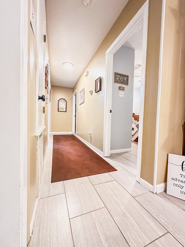 hallway featuring wood finished floors