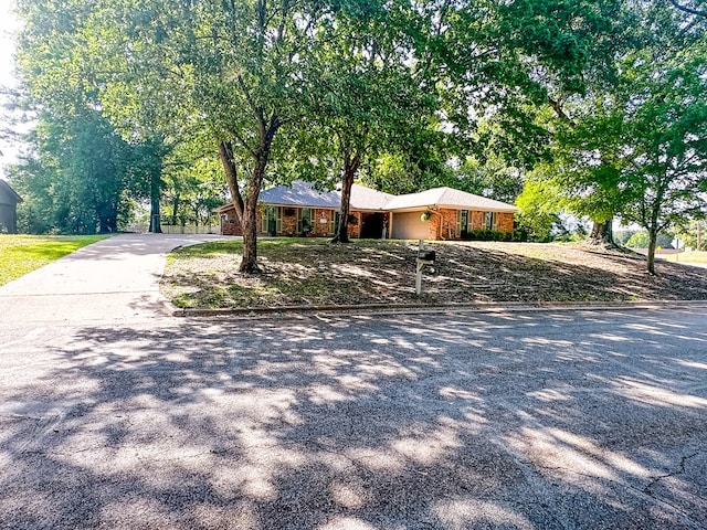 view of front of home featuring driveway