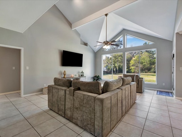 living room featuring light tile patterned flooring, ceiling fan, high vaulted ceiling, and a healthy amount of sunlight