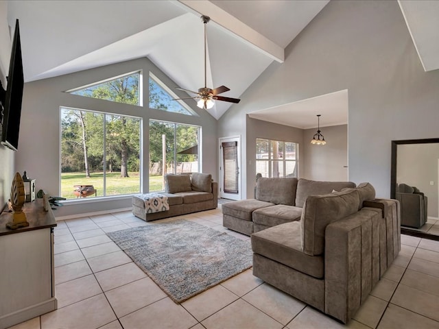 tiled living room with beamed ceiling, high vaulted ceiling, and ceiling fan with notable chandelier