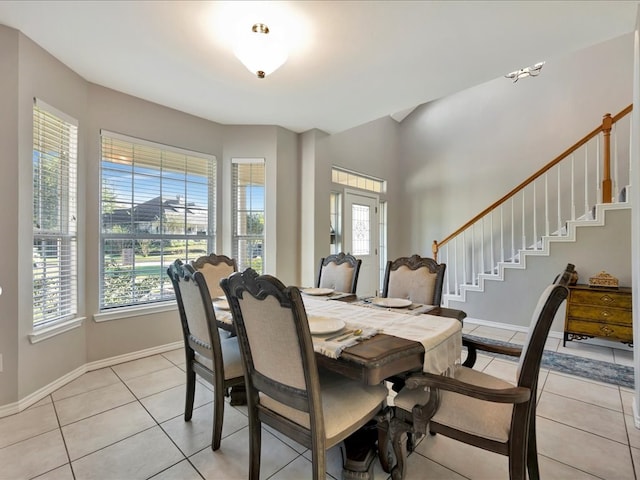 dining room featuring light tile patterned flooring